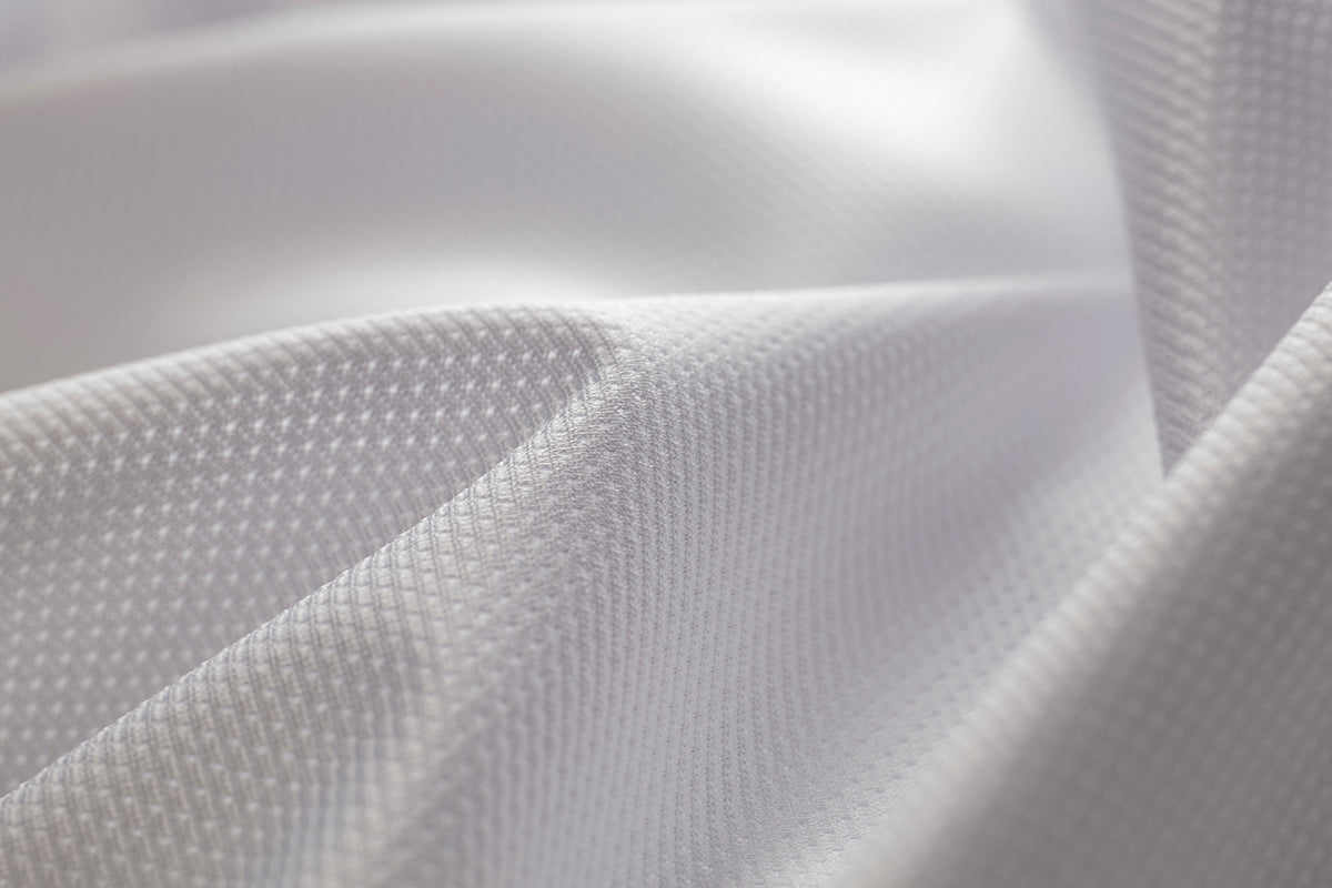 MITI fabric texture — engineered for the ride